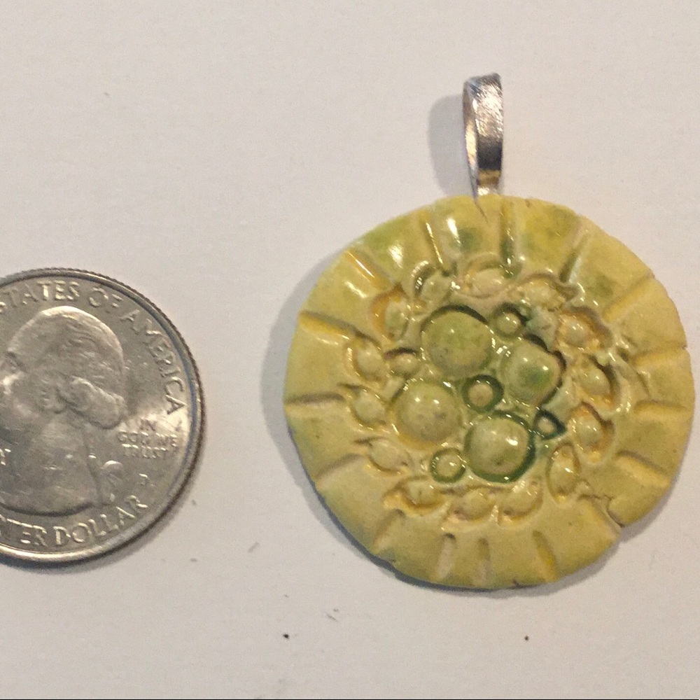 Aromatherapy clay fired pendant